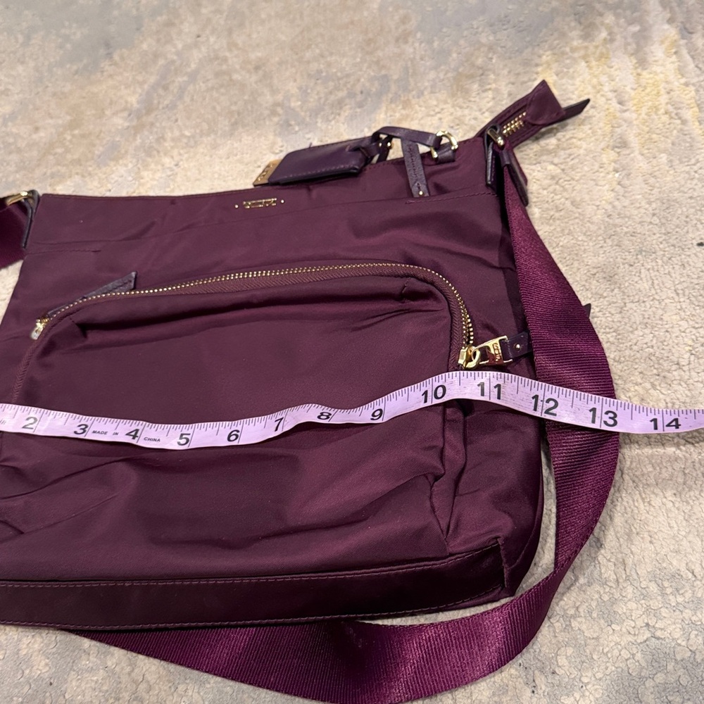 TUMI
Voyageur Capri Crossbody plum purple color in GUC - Picture 10 of 12